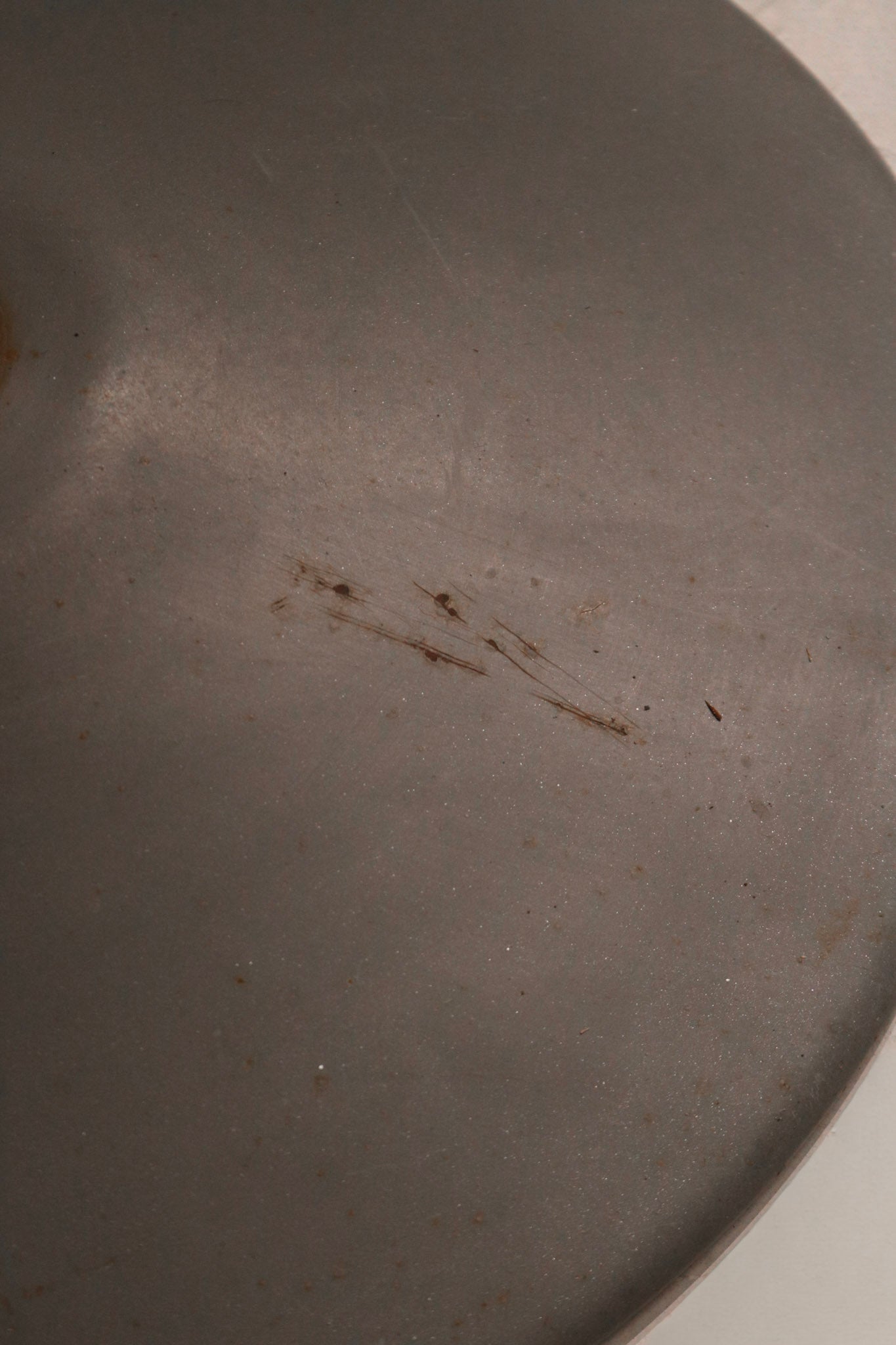 Side angle showing steel legs and chromel base construction with slight wear visible