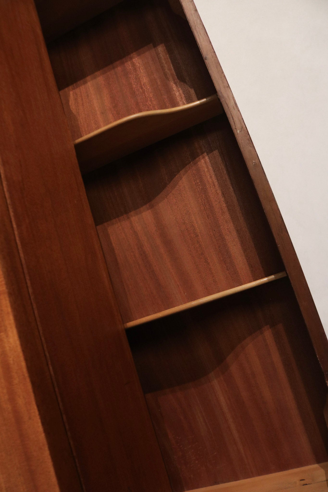 Angle view highlighting overall depth and proportions of vintage solid wood dresser chest, sturdy silhouette and functional drawer layout