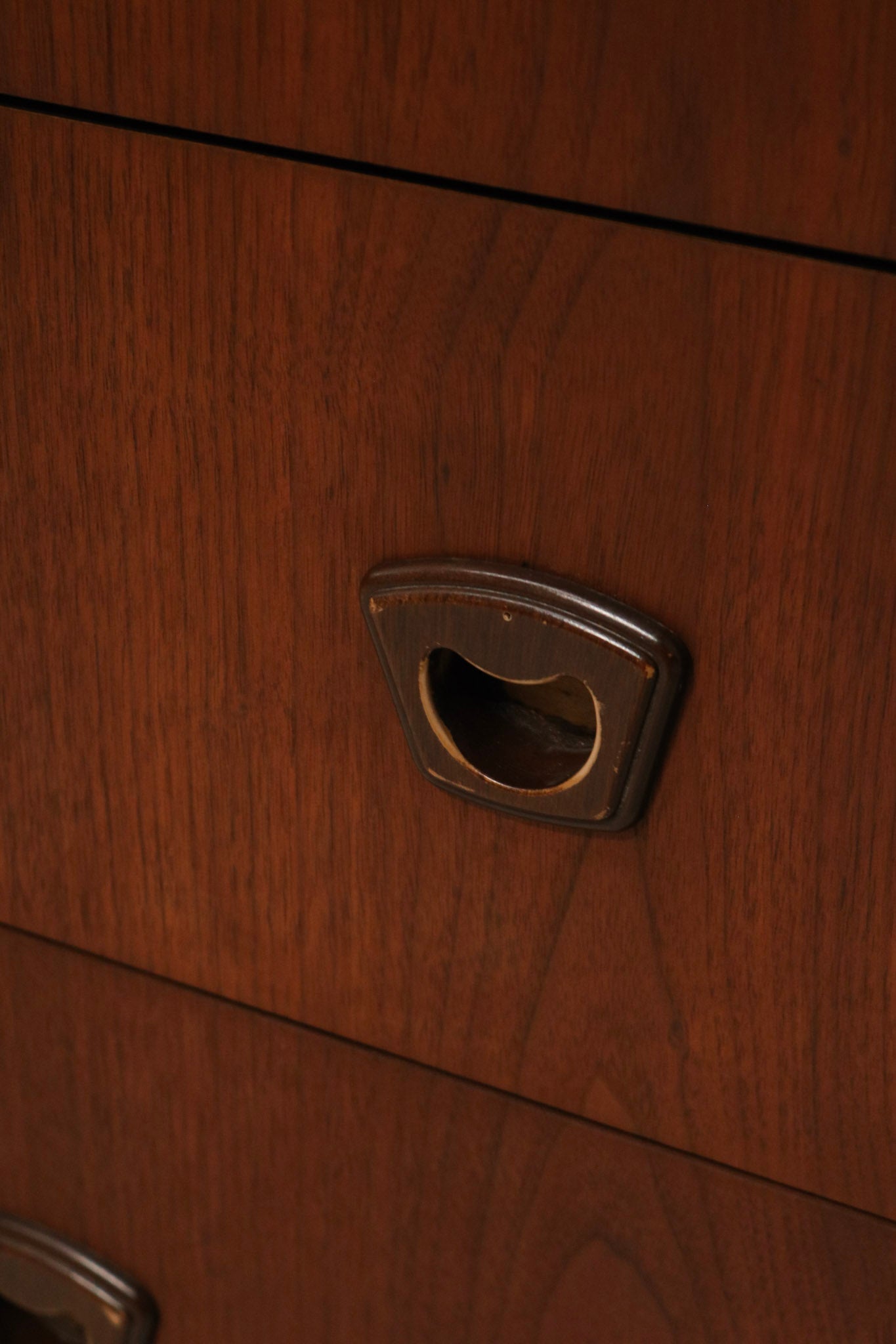 Back view of vintage dresser highlighting clean construction and wood tone