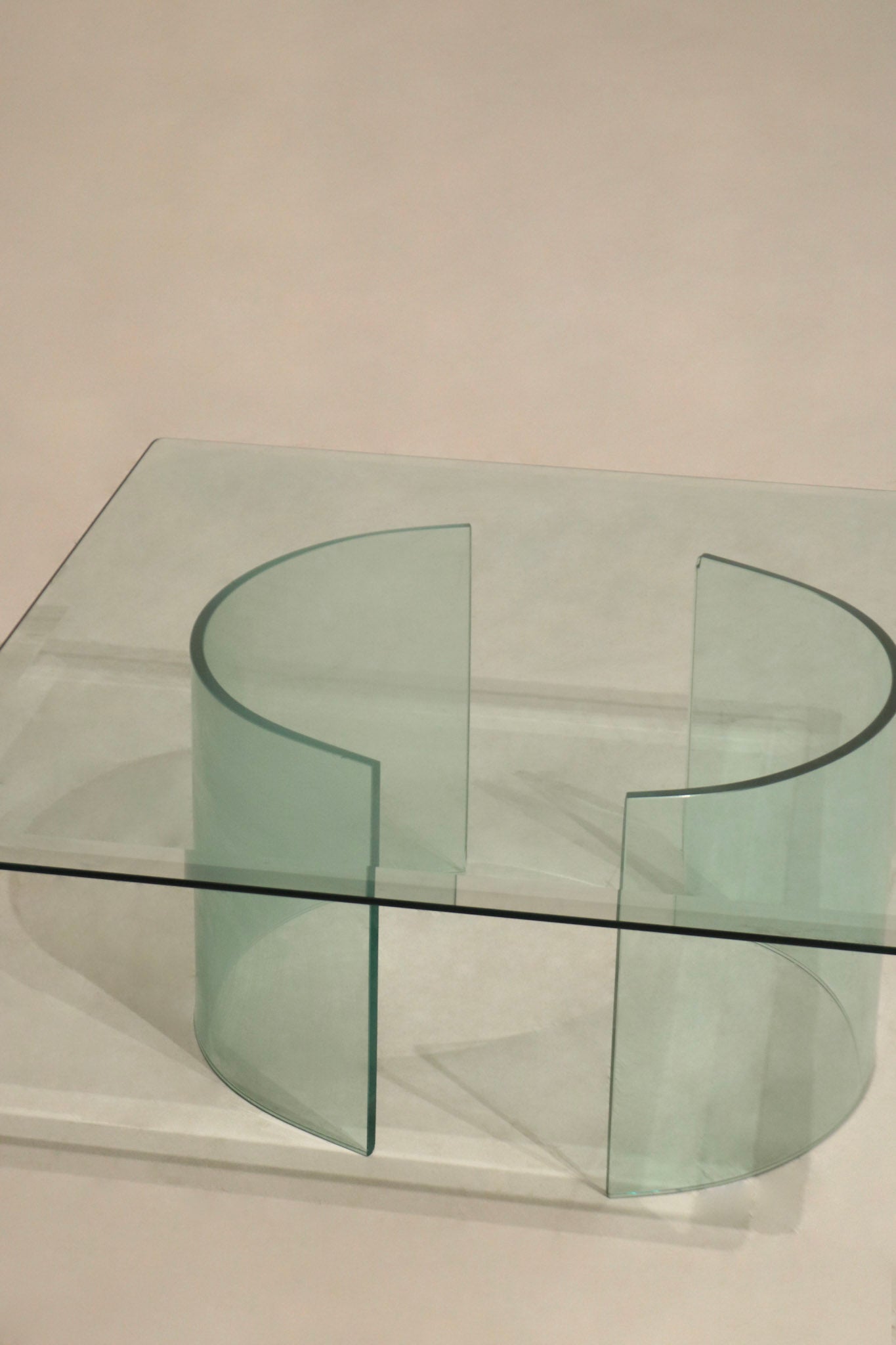 Underneath view of Vintage Square Glass Coffee Table showing how the two glass base pieces are separated