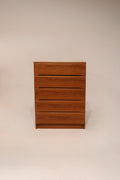 Full view of vintage Danish MCM teak wood 5 drawers dresser with clean lines and warm wood tone