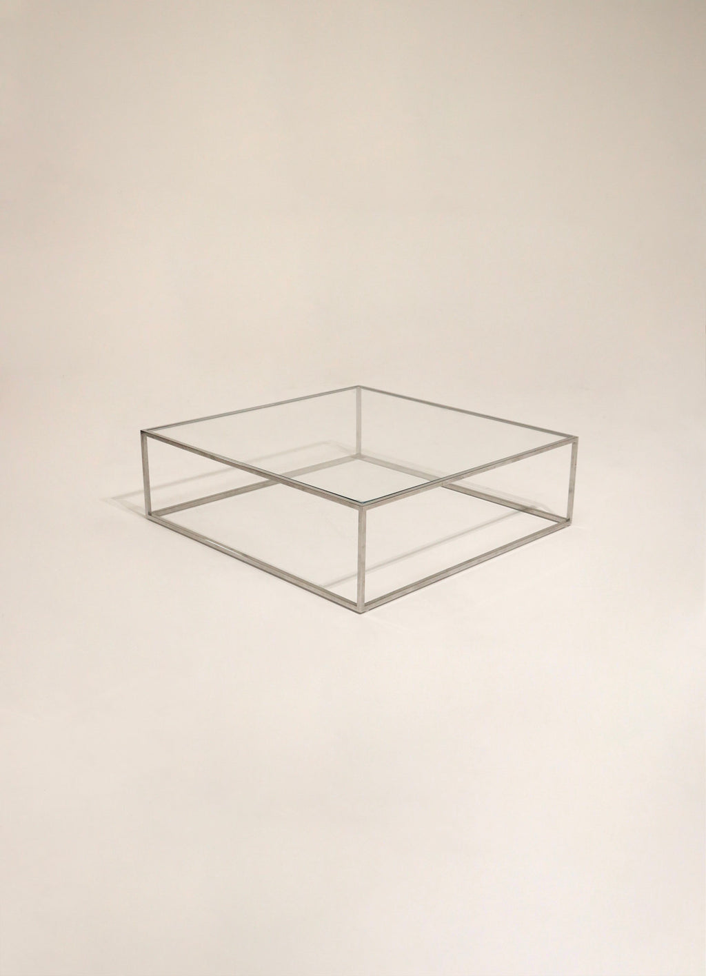 Stylish glass top table with chrome frame