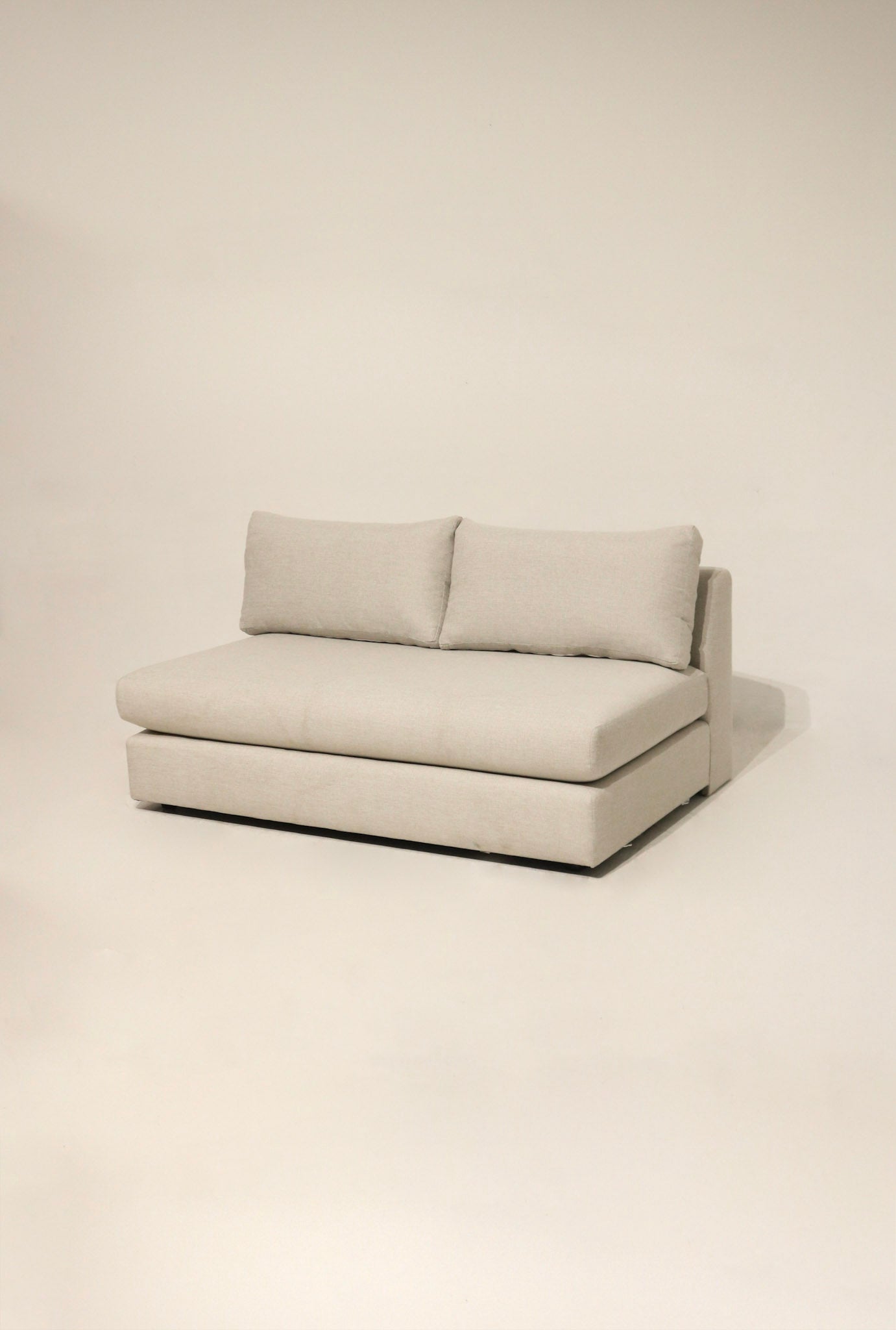 Full frontal view of modern modular chaise loveseat in Thrive quartz fabric with hardwood frame and removable cushions, front angle