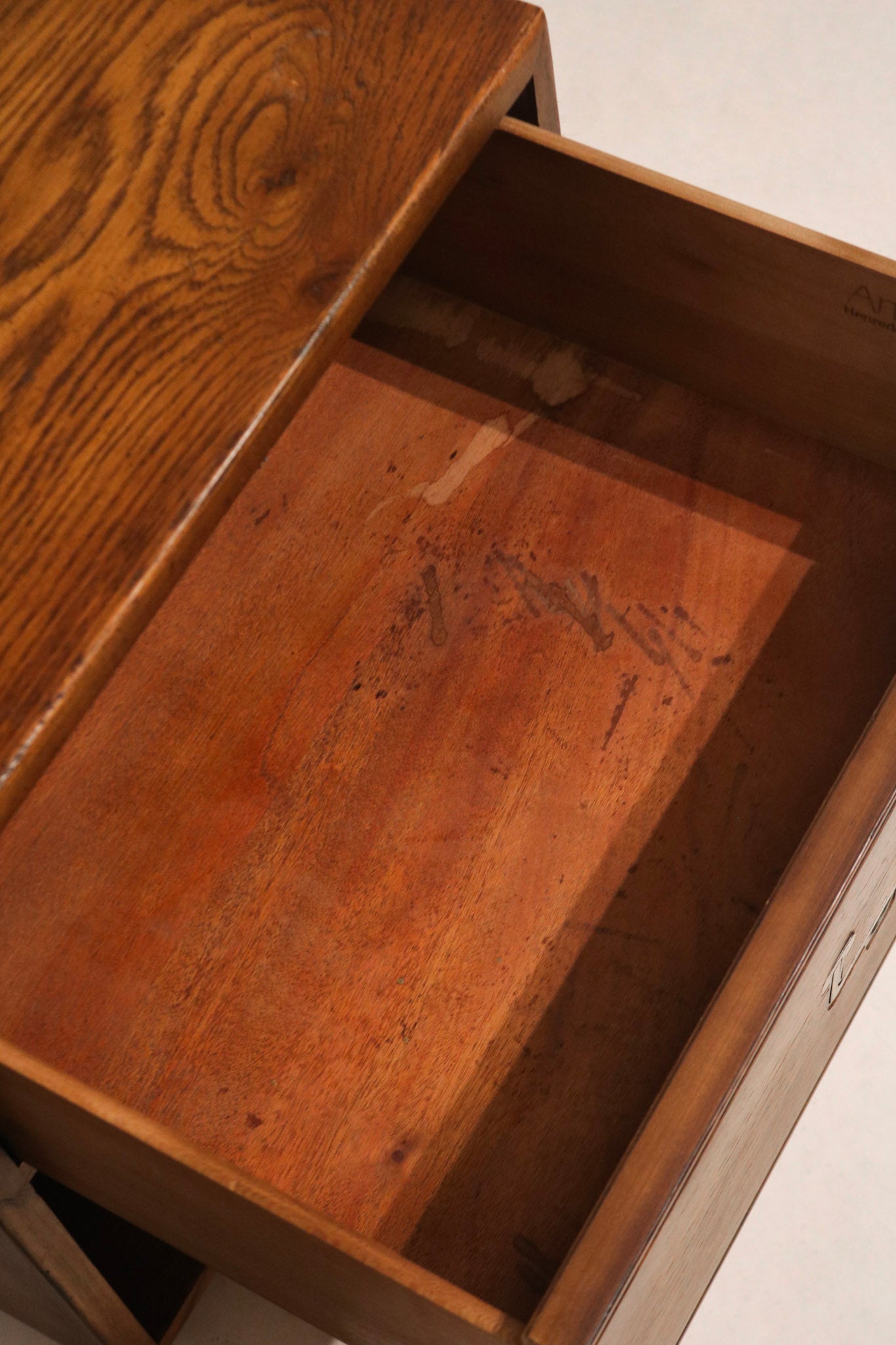 Angled top-down view showing both nightstands paired together in matching oak finish