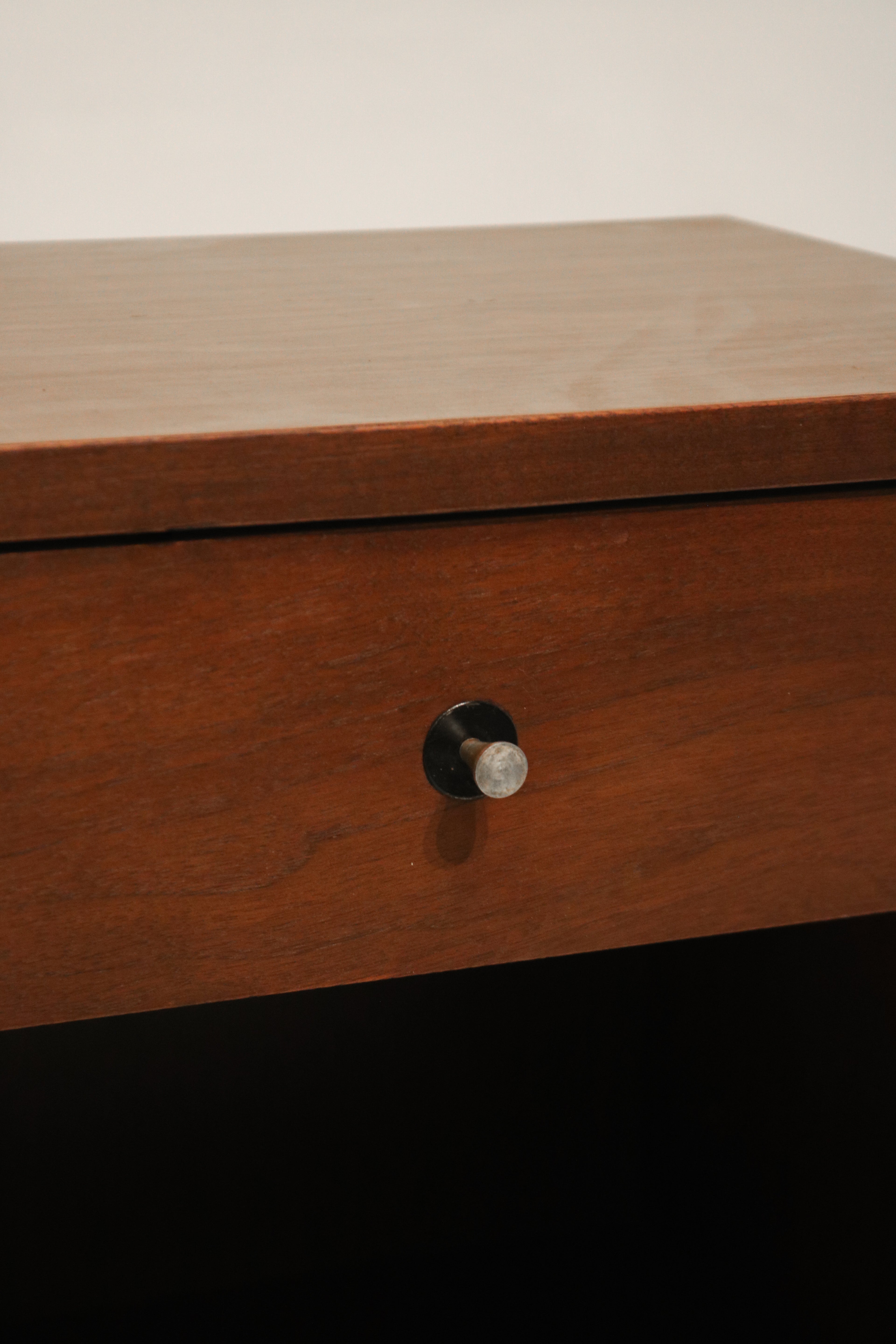 Close-up of solid walnut wood grain texture on Vintage Mcm Nightstand's surface