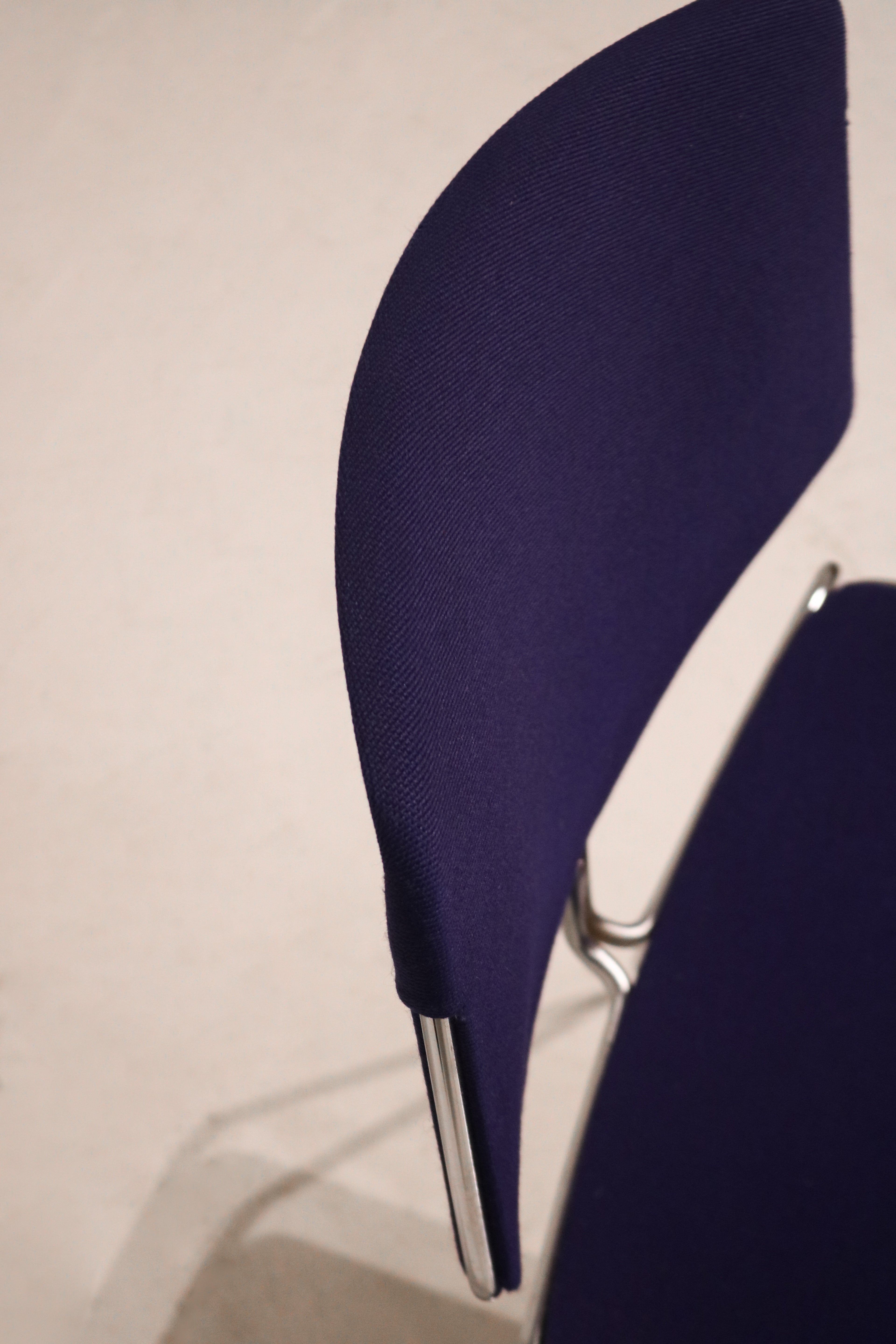 Stacked view of the chairs highlighting space-saving design