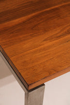 Detail of leg structure showing solid steel material and slightly distressed finish