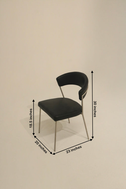 Stylish black dining chairs with brushed metal legs