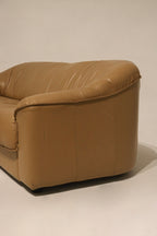Interior shot showing seat depth and backrest insulation of vintage leather couch