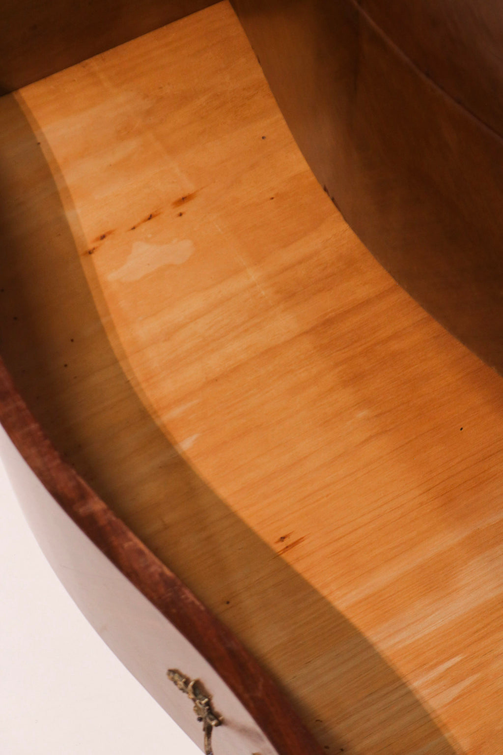 Interior view of drawer showing clean wood condition and construction