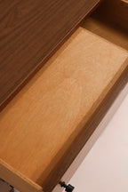 Interior view of drawer showing clean wood condition and finish