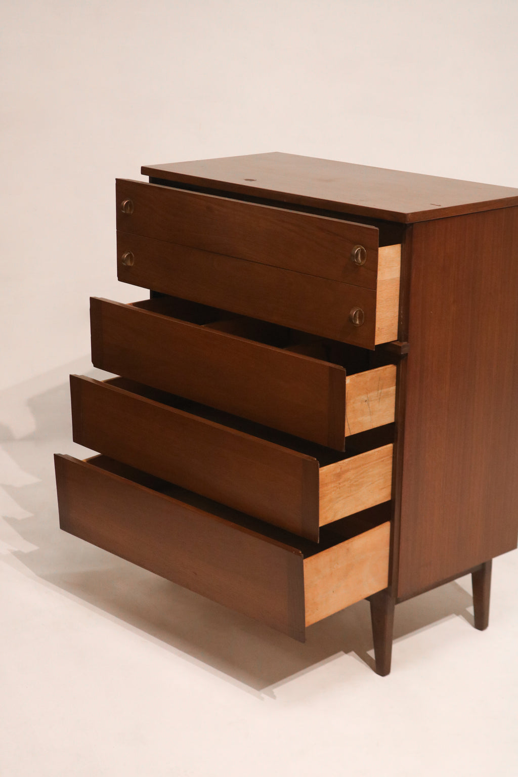 Interior view of drawer showing clean wood construction and storage depth