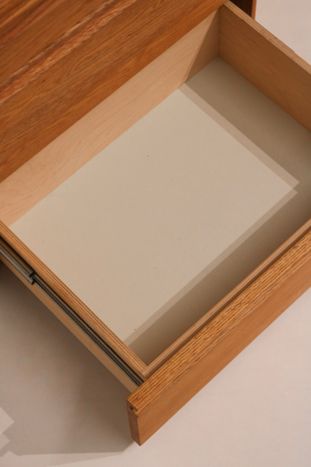 Interior view of drawer showing clean condition and sturdy construction