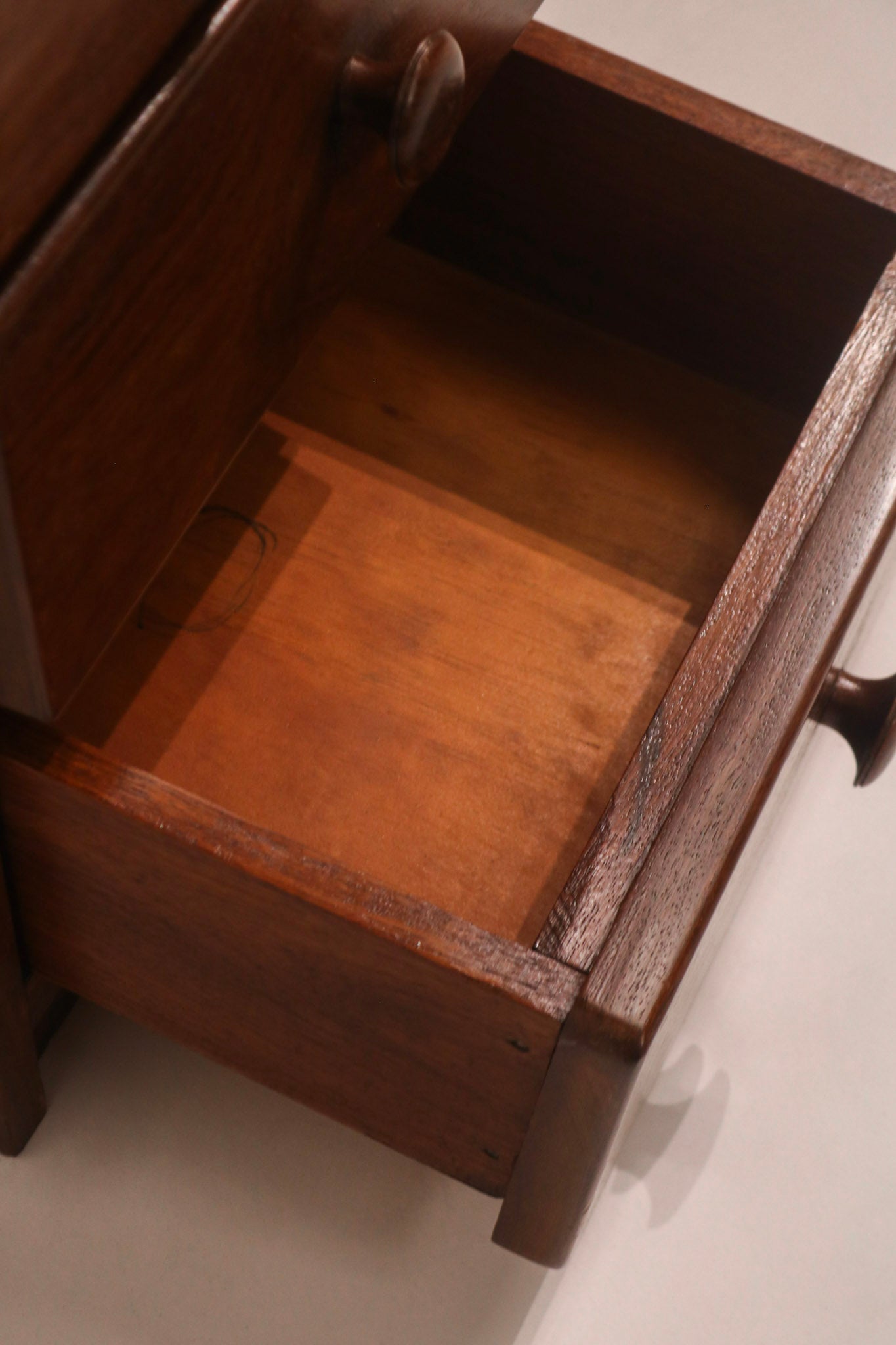 Interior view of the drawer showing clean wood condition and joinery