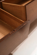 View of drawer interior construction showing dovetail joints