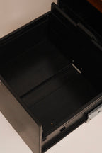 Interior view of steel drawer construction with black finish
