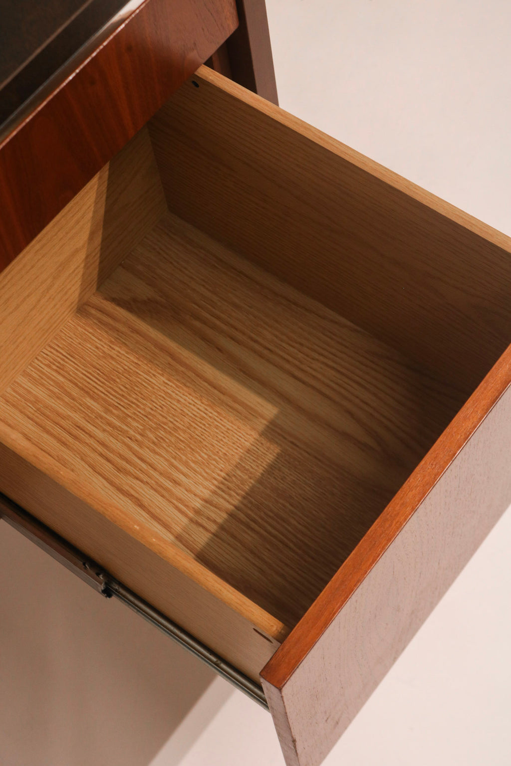 Interior view of drawer showing clean wood condition