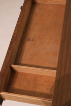 Interior view of drawer showing wood condition and noted stains