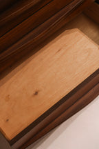 Detail of drawer interior showing wood surfaces and clean condition