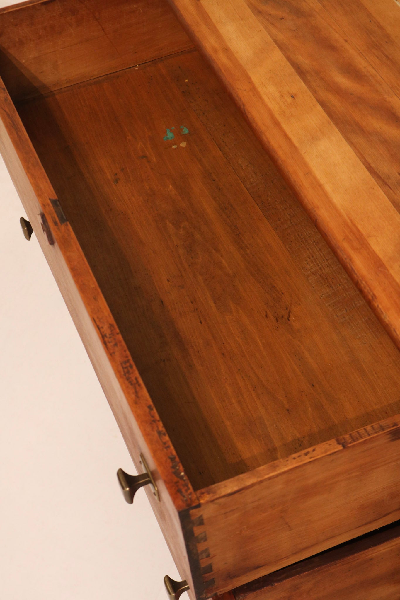 Close-up of drawer side showing handcrafted dovetail joinery details