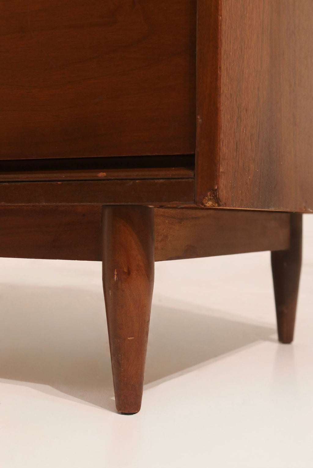 Rear view of dresser showing back panel construction and stability