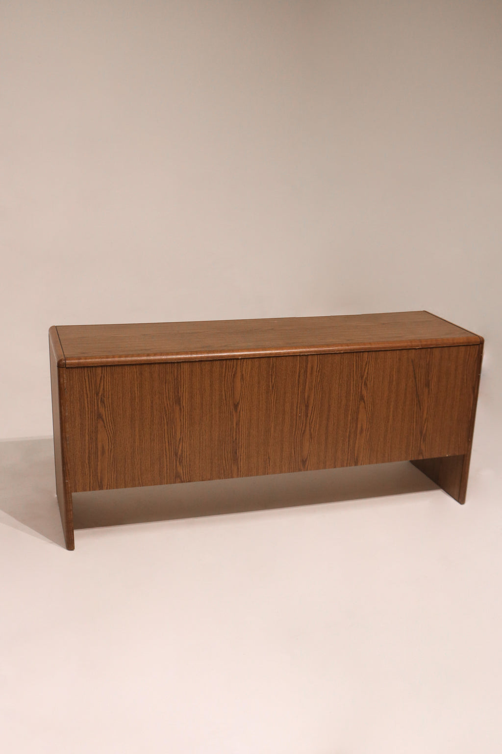 Full back panel view of vintage credenza showing finished wood surface