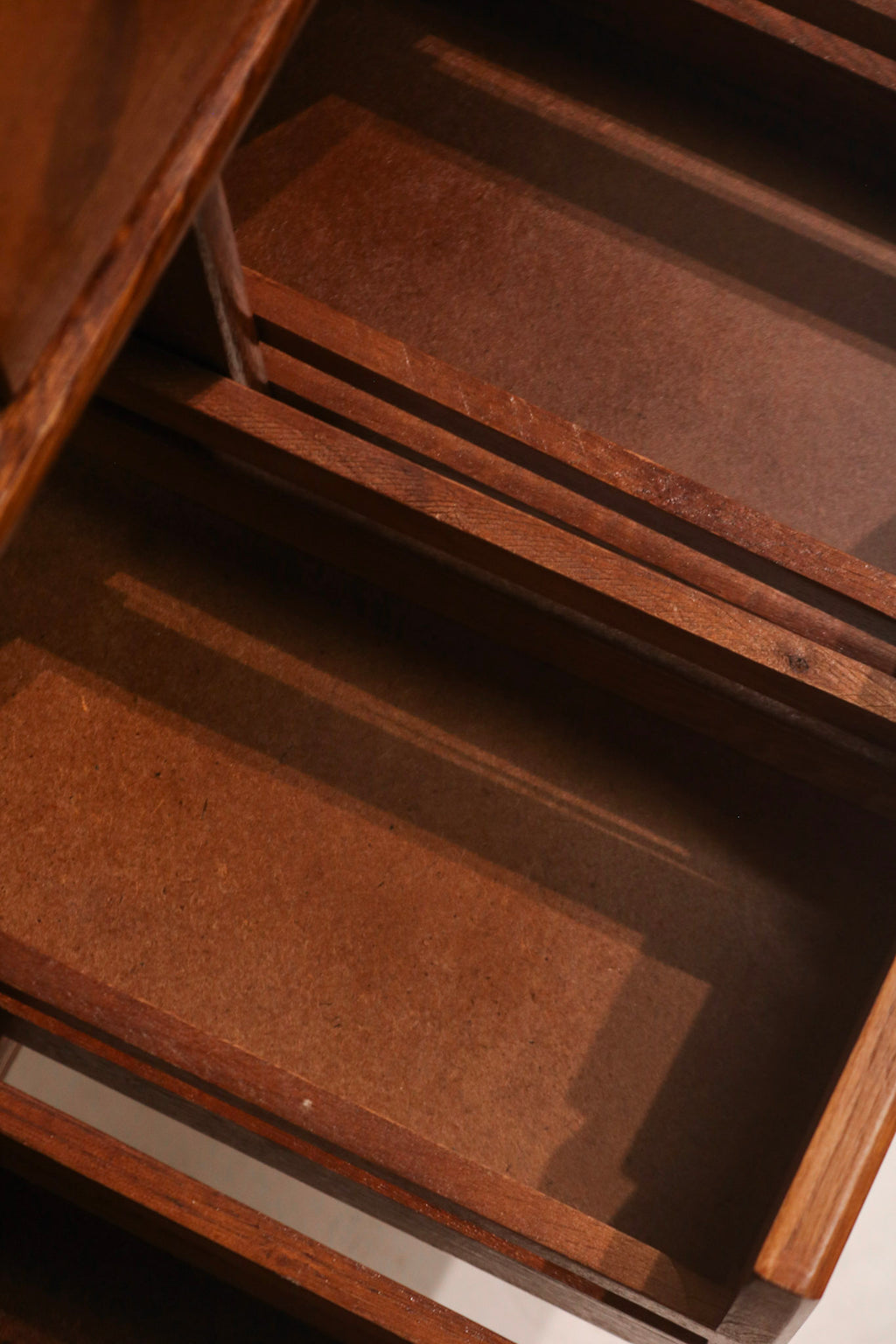 Front lower panel joint detail showing rustic oak assembly quality