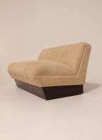 Front seat edge detail showing contrast with dark solid wood base