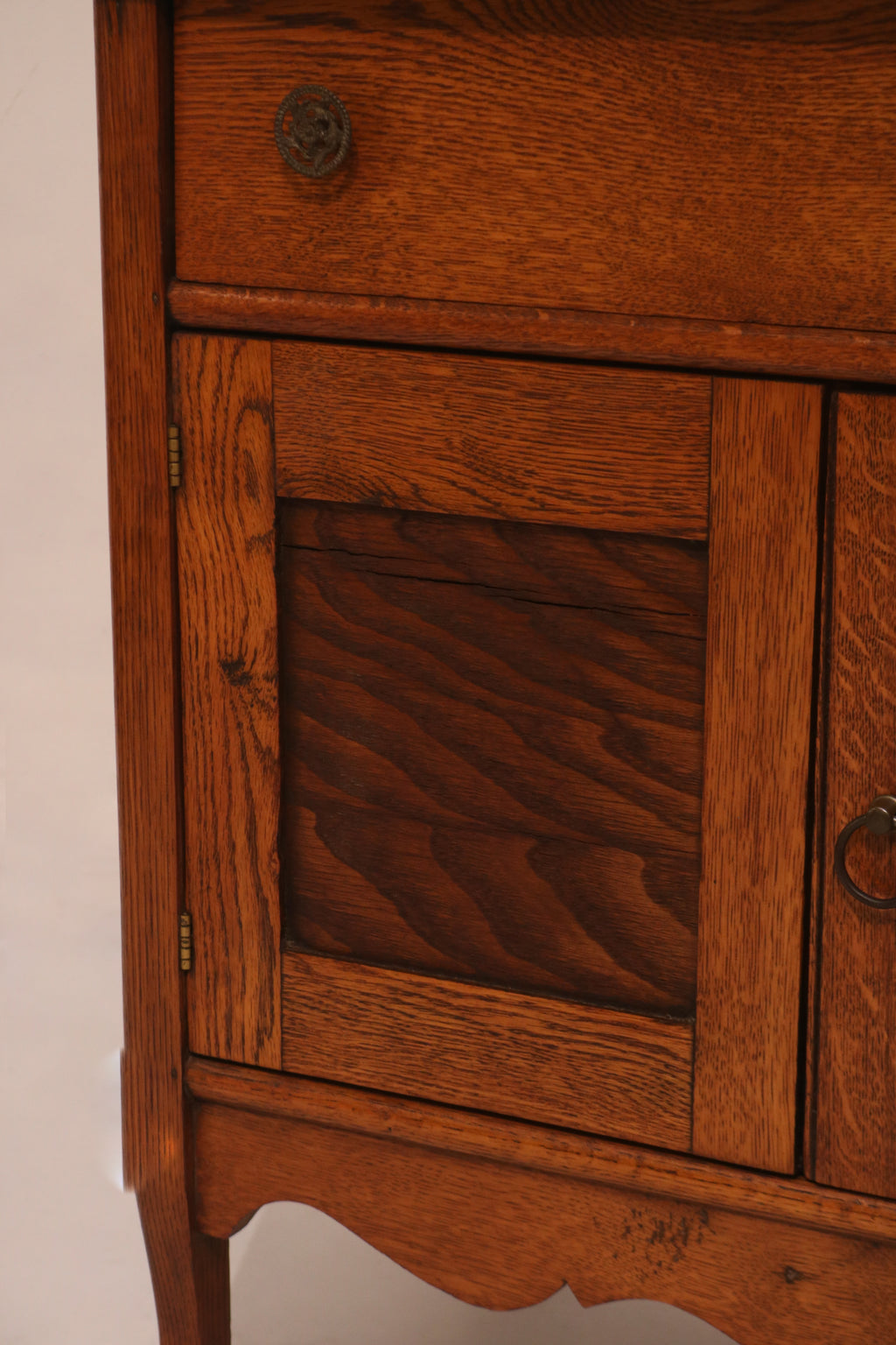Full front view of the antique washstand design with drawer and cabinet