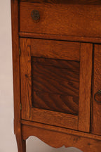 Full front view of the antique washstand design with drawer and cabinet