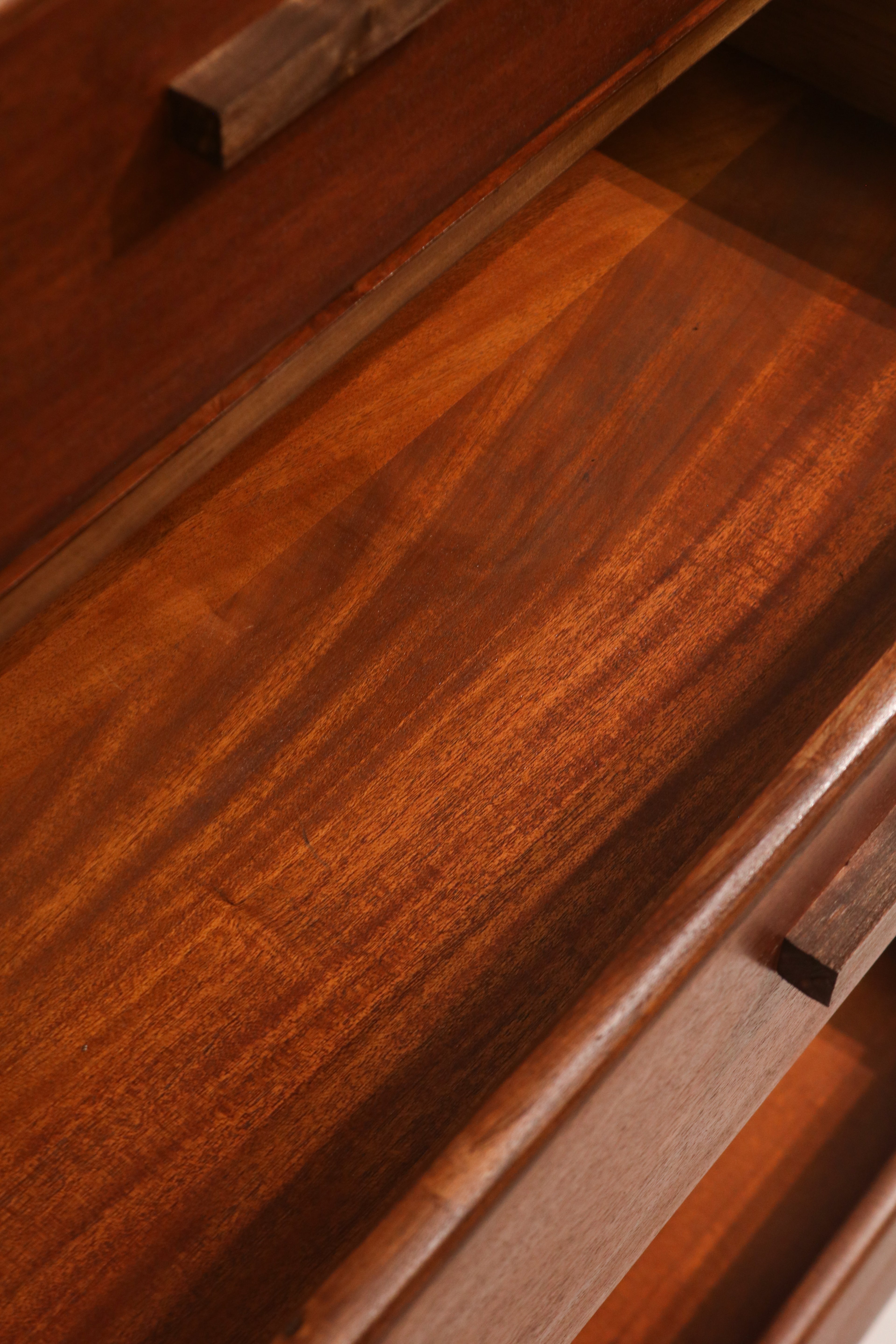 Full view of the dresser with multiple drawers open showing capacity