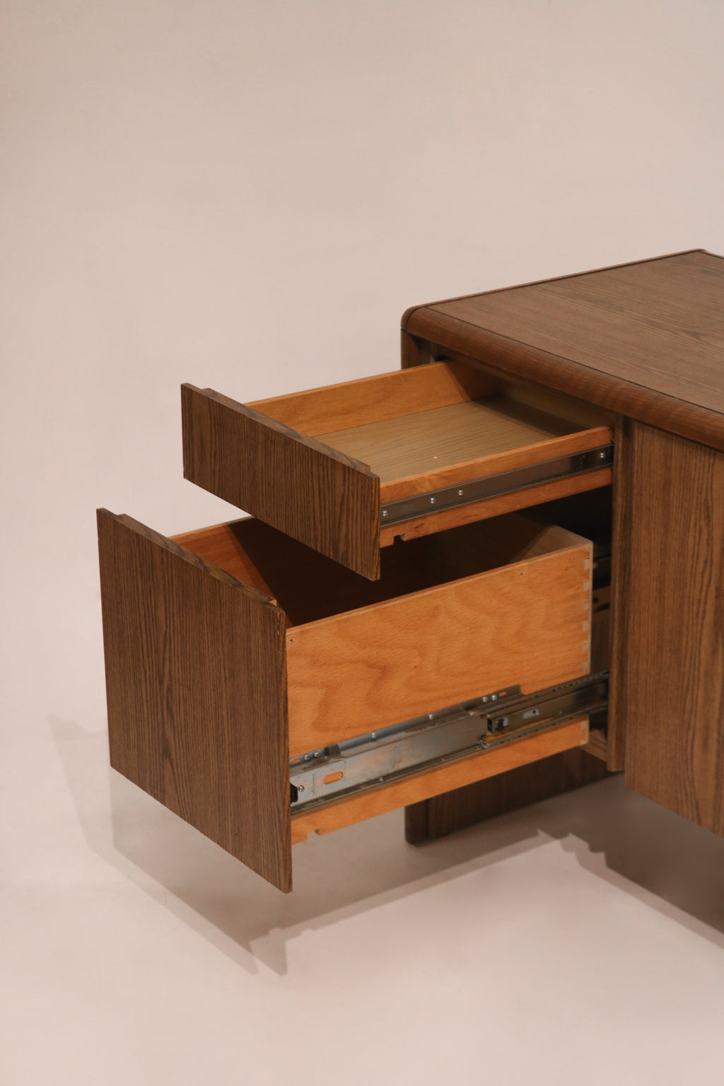 Side view of fully extended drawers showing smooth gliding hardware mechanism