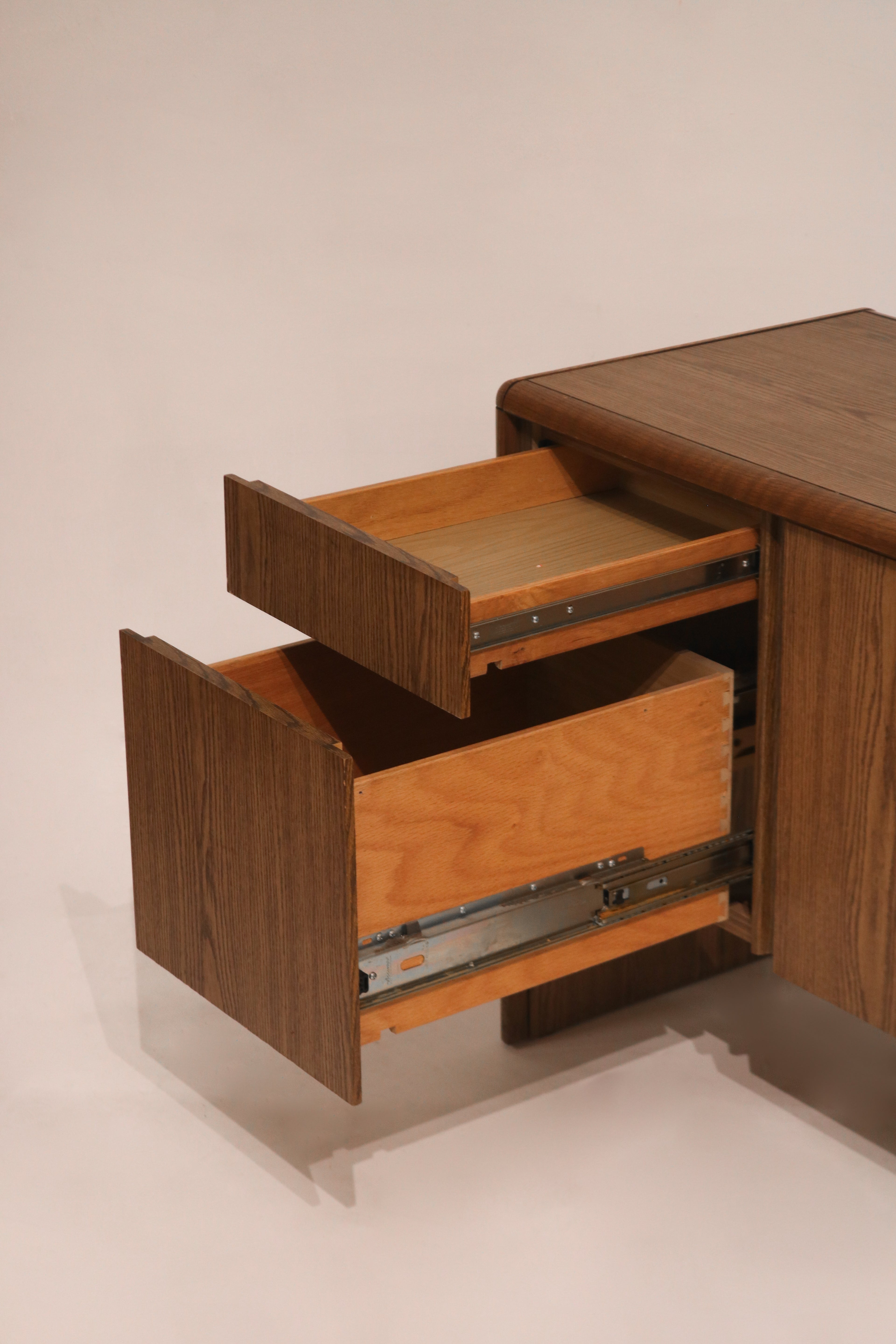 Side view of fully extended drawers showing smooth gliding hardware mechanism