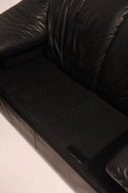 Full side angle view showing armrest support and overall sofa proportions