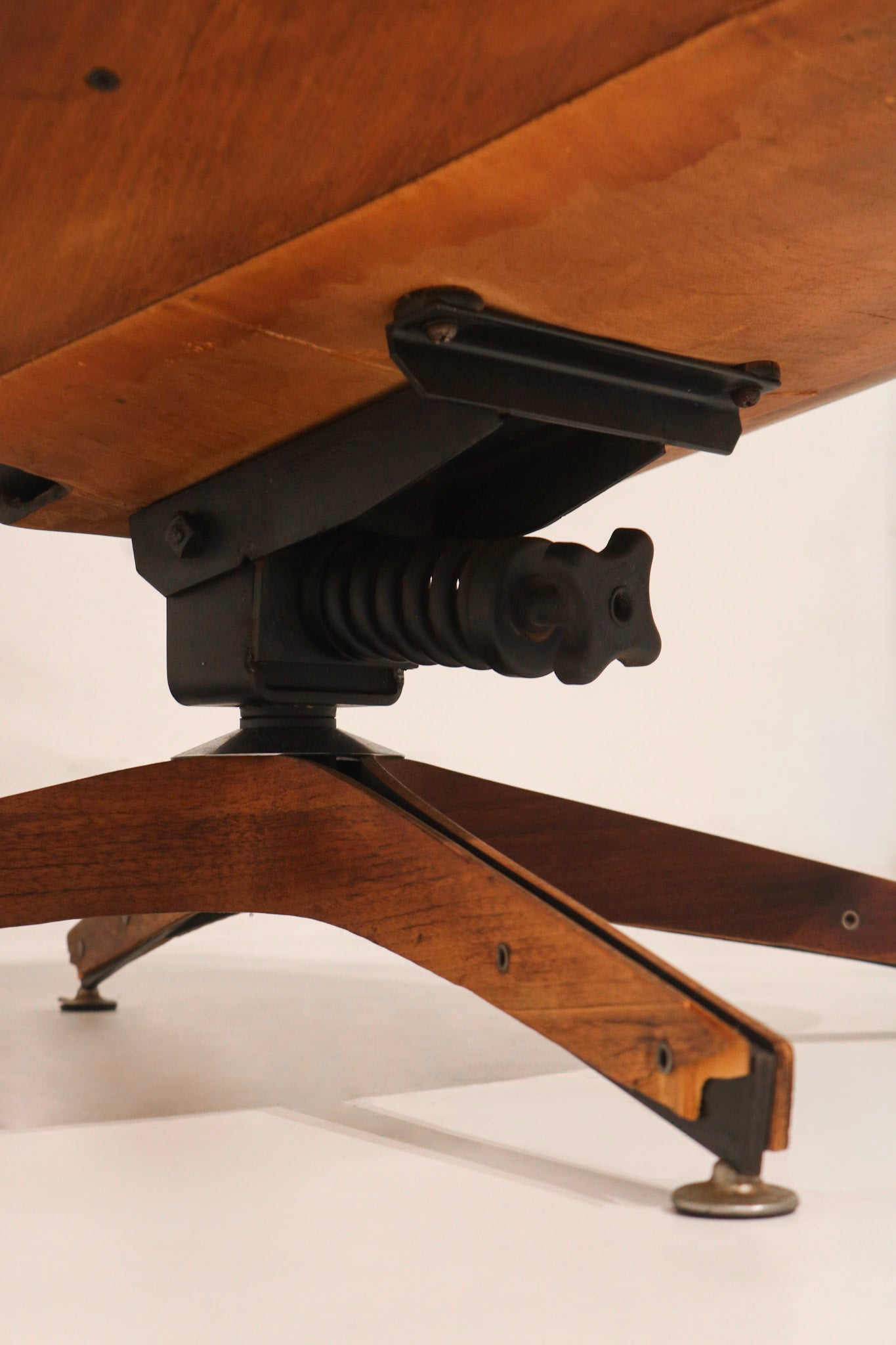 Full side view showing the chair's mid-century modern design silhouette