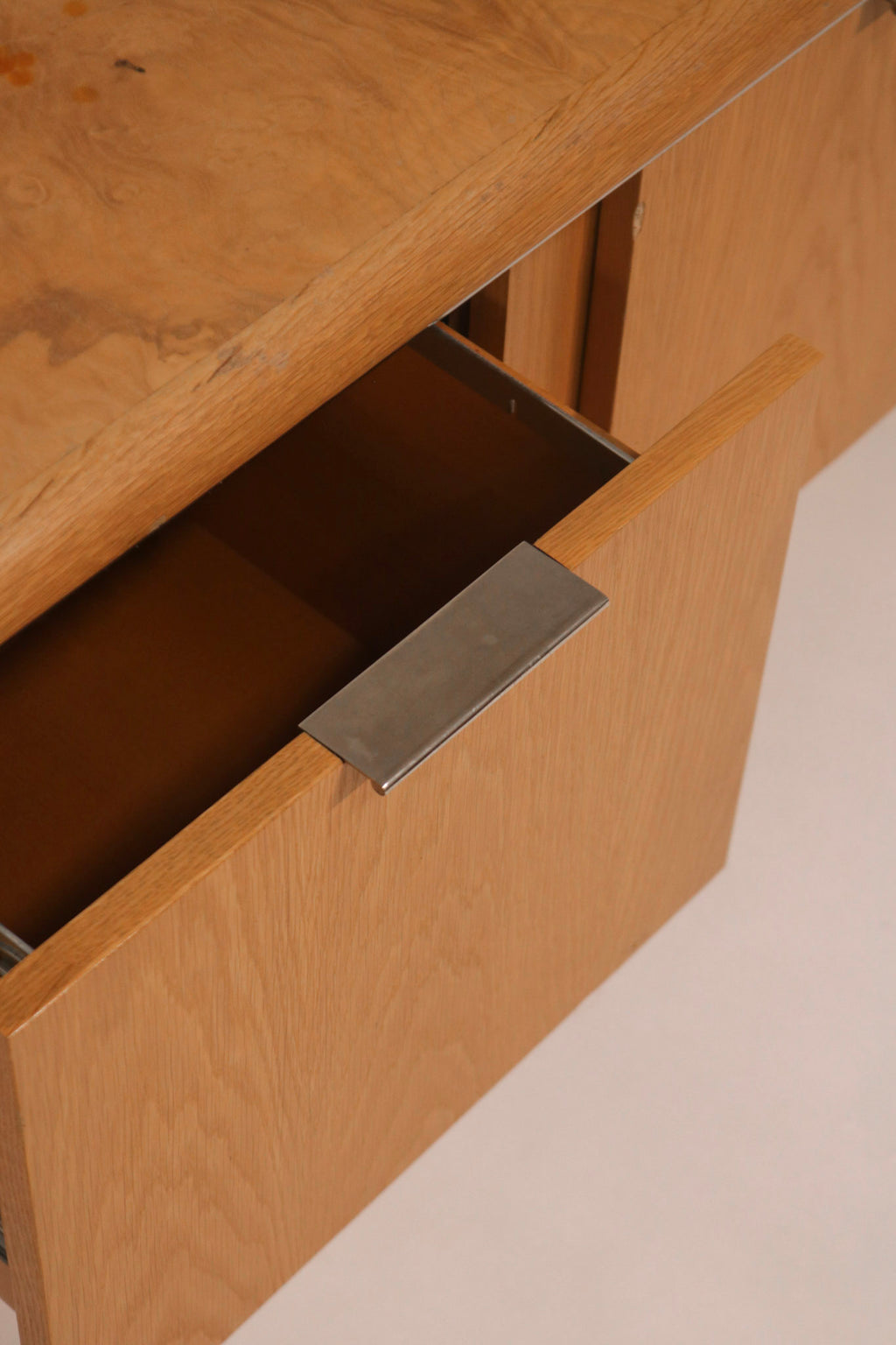 Geometric design pattern detail on credenza front panels burl and oak wood