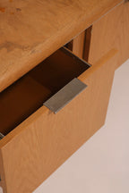 Geometric design pattern detail on credenza front panels burl and oak wood