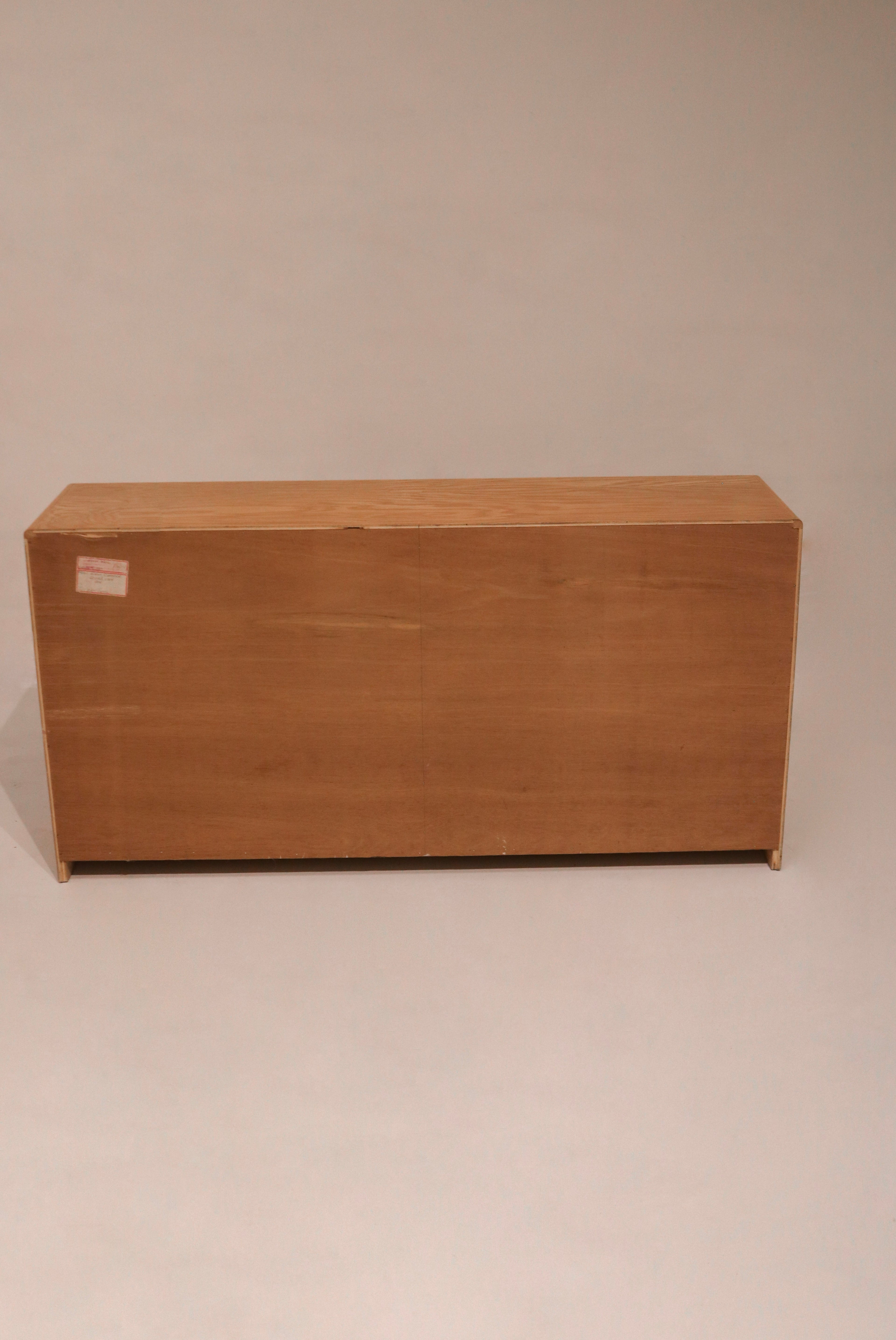 Detail of grid pattern design on drawer fronts adding texture