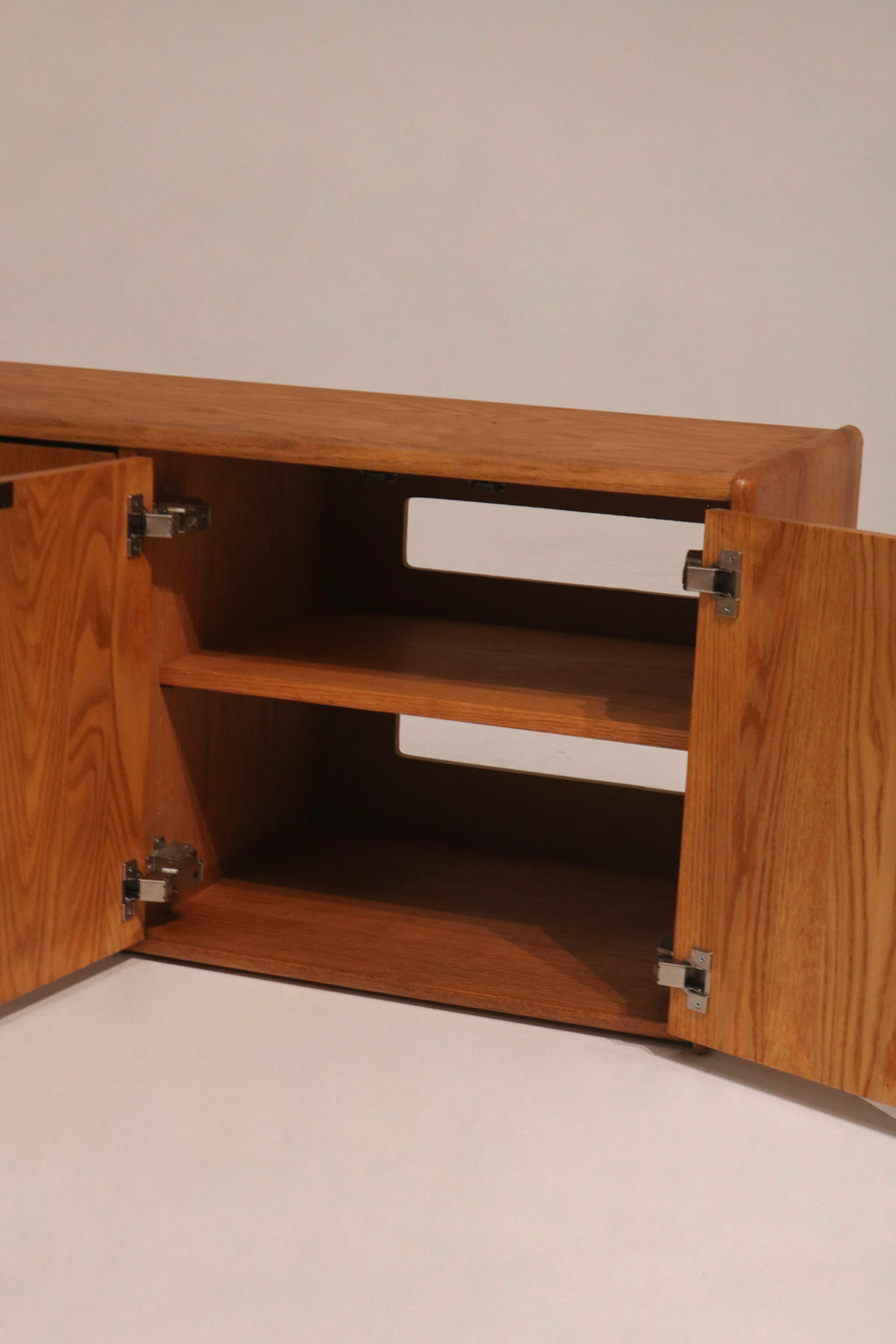 Interior view showing the shelf and sturdy door hinges