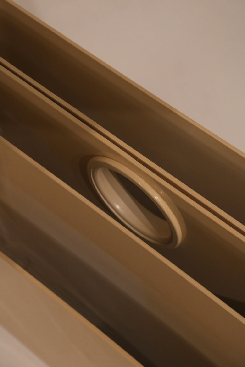 Detail of interior compartment with circular opening design feature