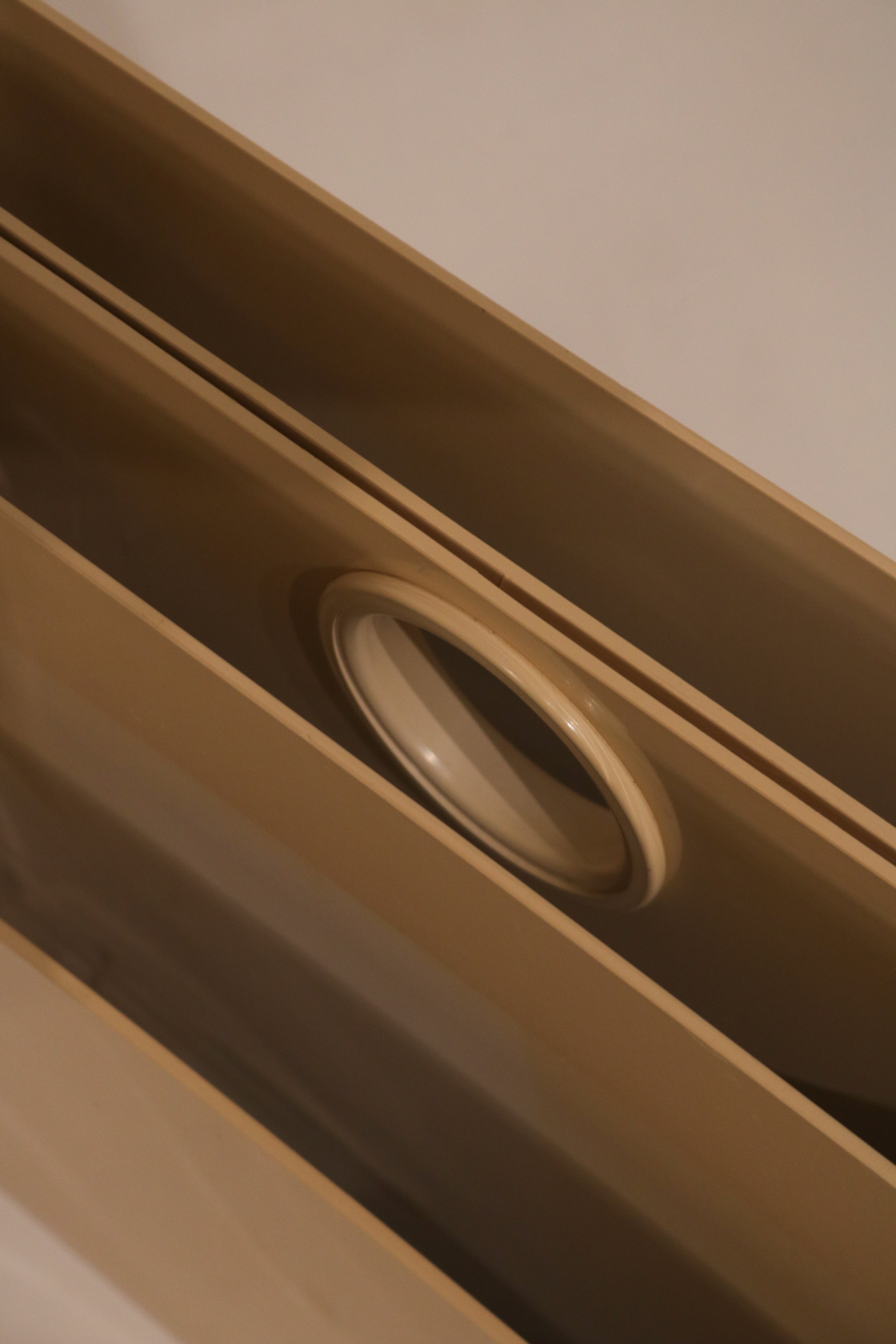 Detail of interior compartment with circular opening design feature