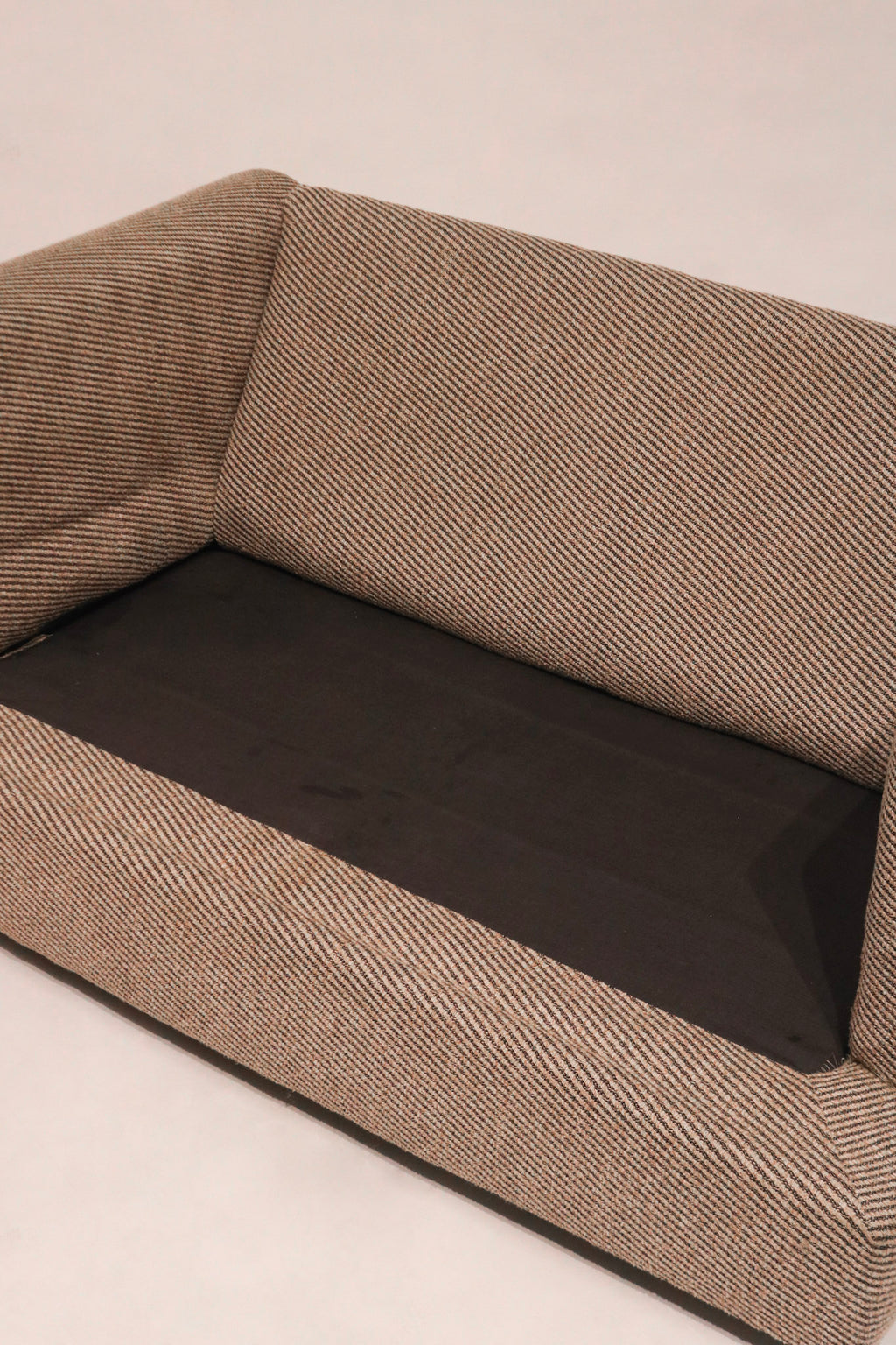 View of the interior frame cleanliness with seat cushions removed