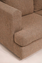 Close-up of the left arm showing fabric texture and clean condition