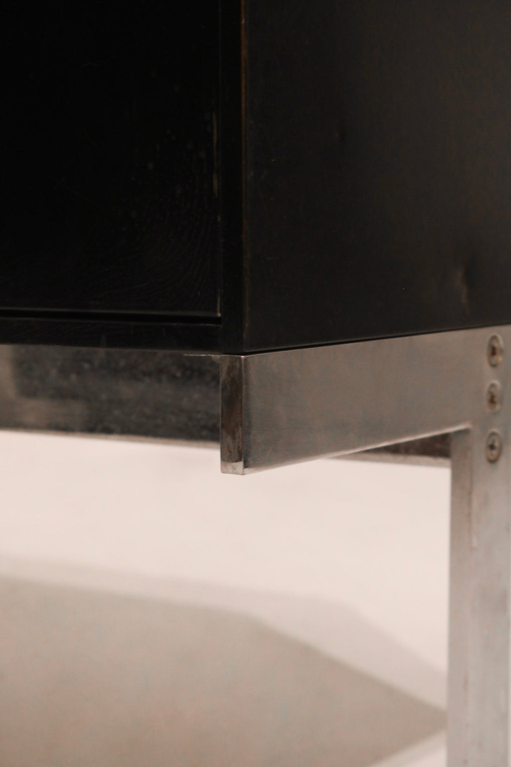 Left side cabinet door open showing interior shelf space