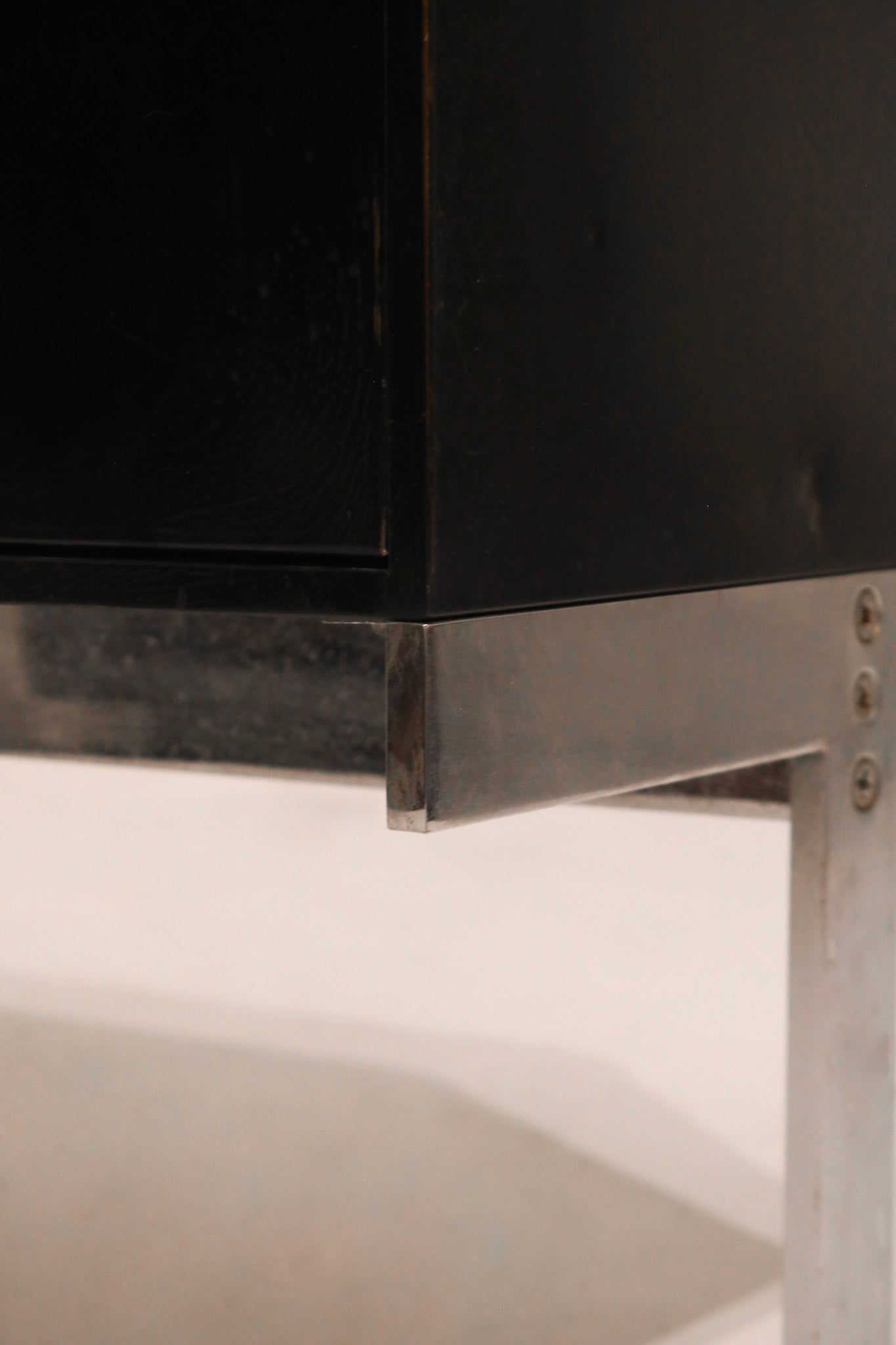 Left side cabinet door open showing interior shelf space