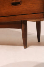 Left side profile showing leg design and cabinet construction mid-century style