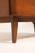 Left side view showing the dresser structure and tapered legs