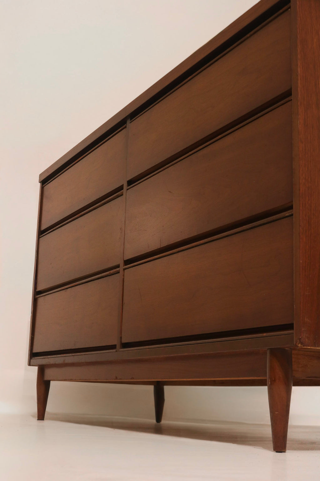 Left side view highlighting walnut finish condition and grain