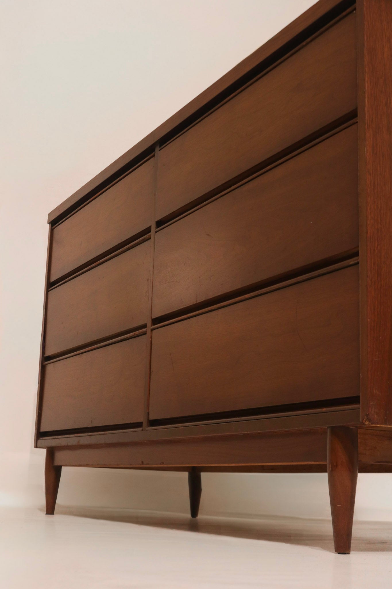 Left side view highlighting walnut finish condition and grain