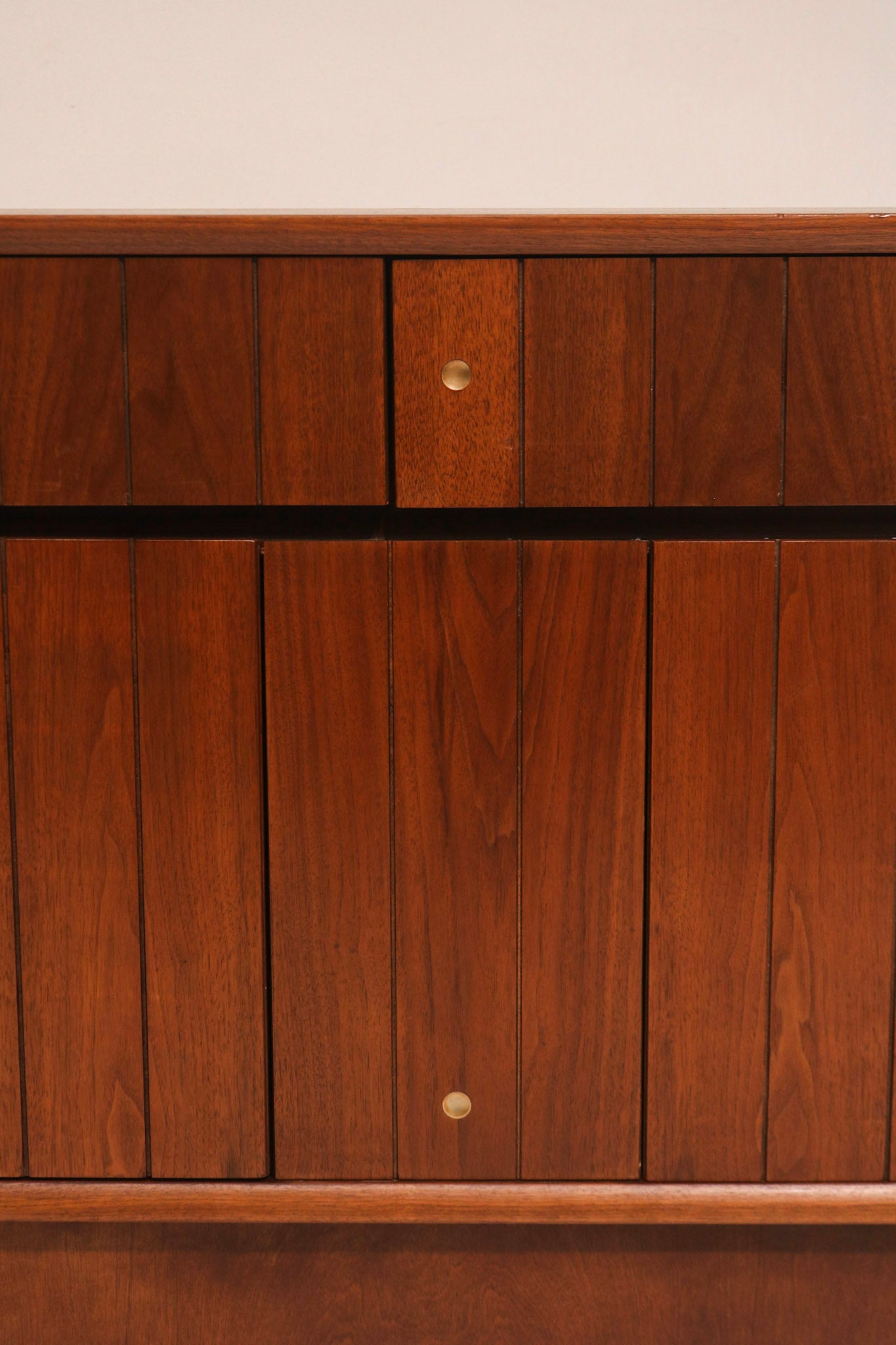 Low angle view emphasizing the modern geometric style of the credenza
